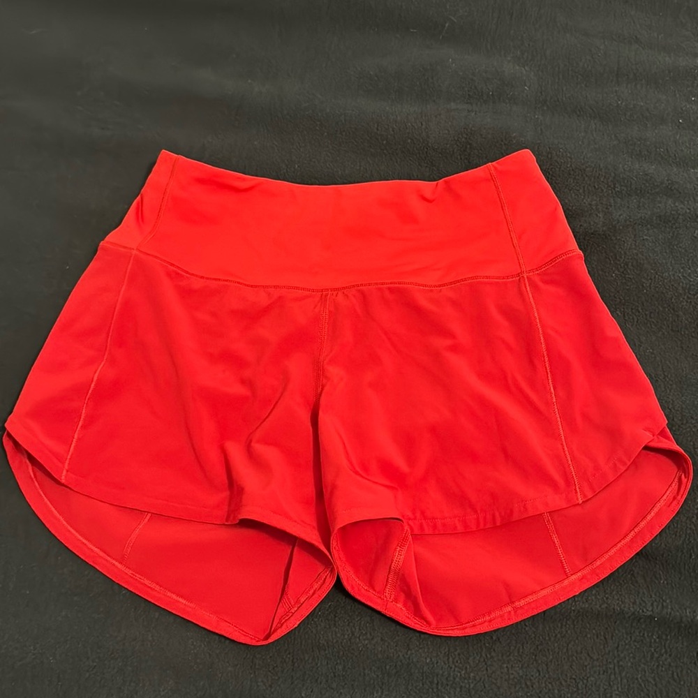 Red 4” Lululemon speed-ups (high rise)